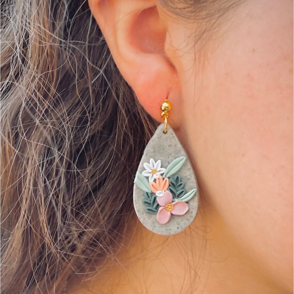 Polymer clay dangling tear drop dangling earrings.